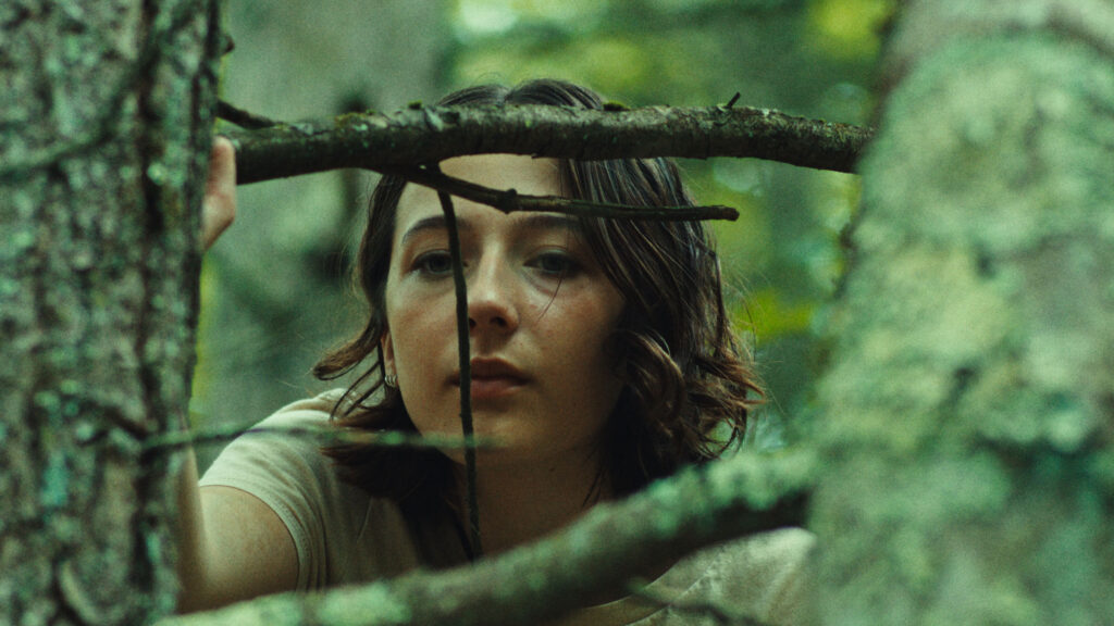 Good One- girl face among trees